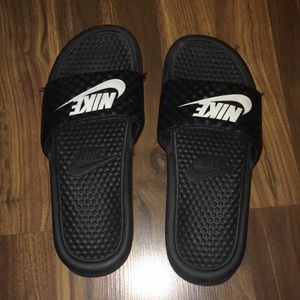 Black and white Nike slide sandals